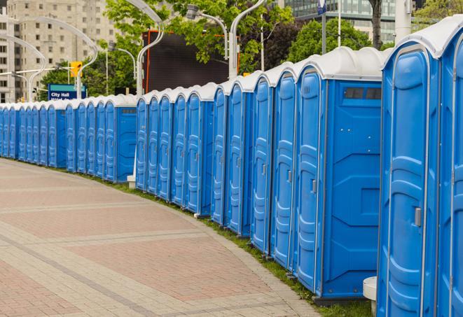 a row of portable restrooms set up for a special event, providing guests with a comfortable and sanitary option in Bartlett IL